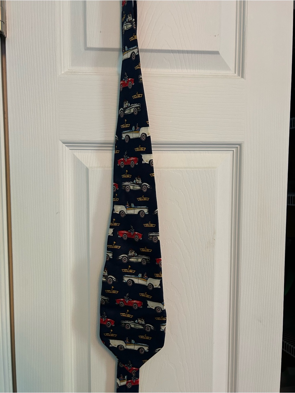 Warner Bros. Navy Tie with Red, White, and Gold Car Motif